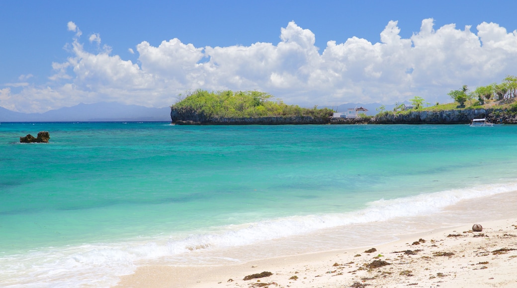 Guimbitayan Beach showing a sandy beach and general coastal views