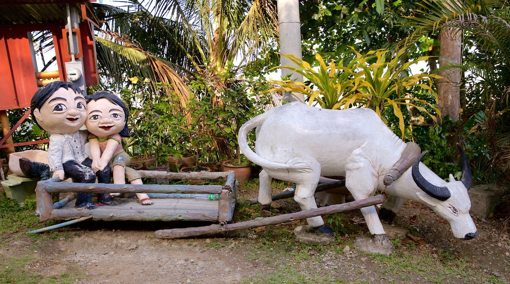 Cebu som inkluderar en staty eller skulptur