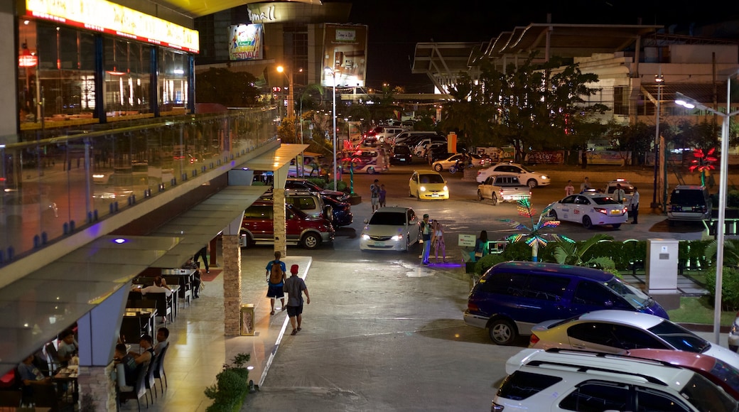 Cebu Island which includes night scenes and a city