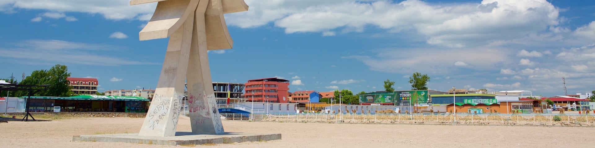Obelisk showing a beach and outdoor art