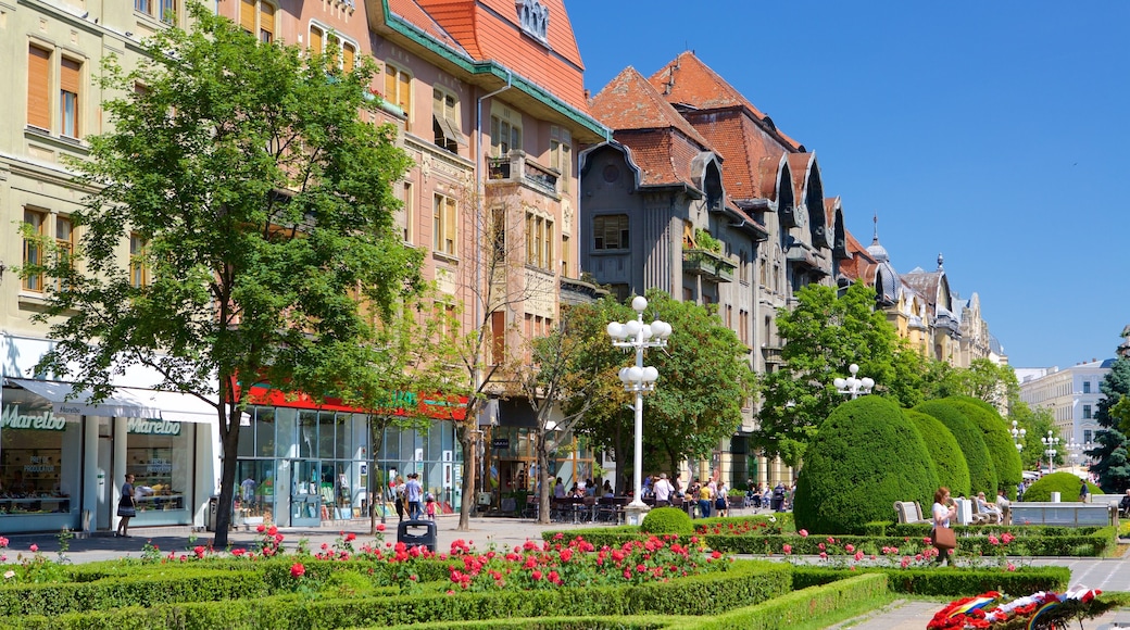 Piata Operei which includes heritage architecture and a garden