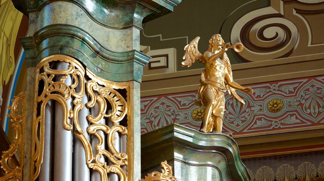 Roman Catholic Basilica showing a statue or sculpture, a church or cathedral and heritage architecture