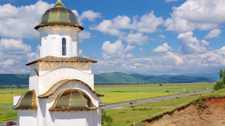 Romania which includes farmland and modern architecture