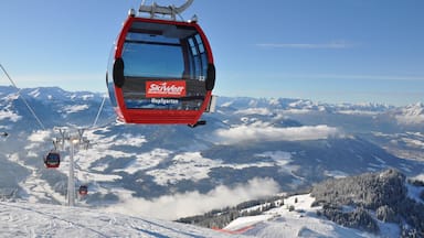 Hopfgarten im Brixental featuring snow, a gondola and mountains