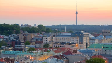 Vilnius TV Tower which includes a sunset