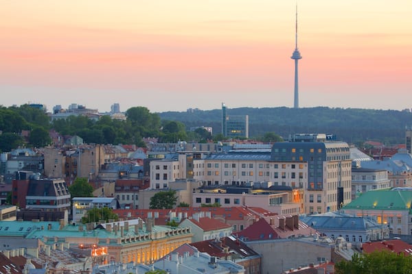 Vilnius TV Tower featuring a sunset
