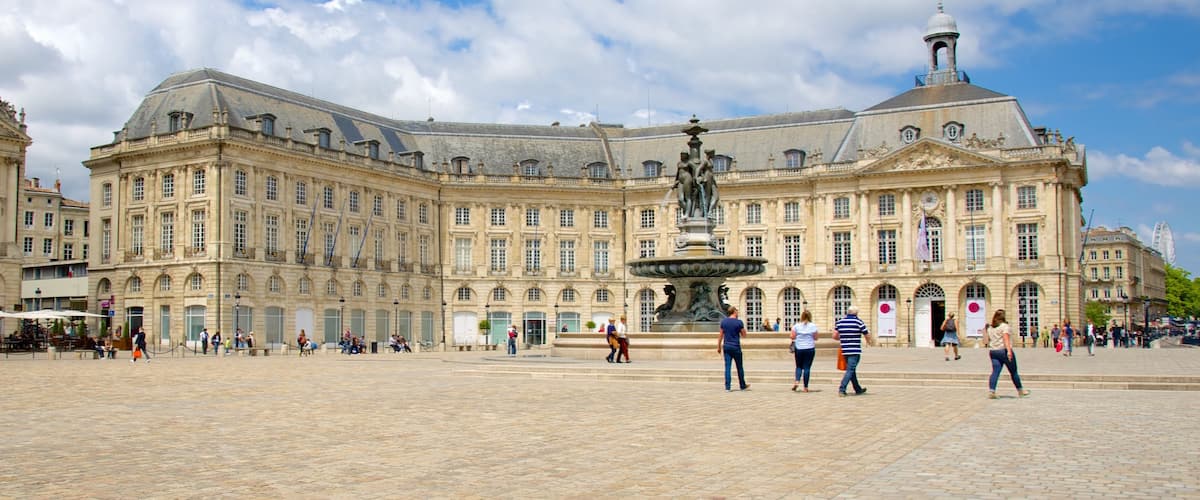 Place de la Bourse featuring heritage architecture and a square or plaza