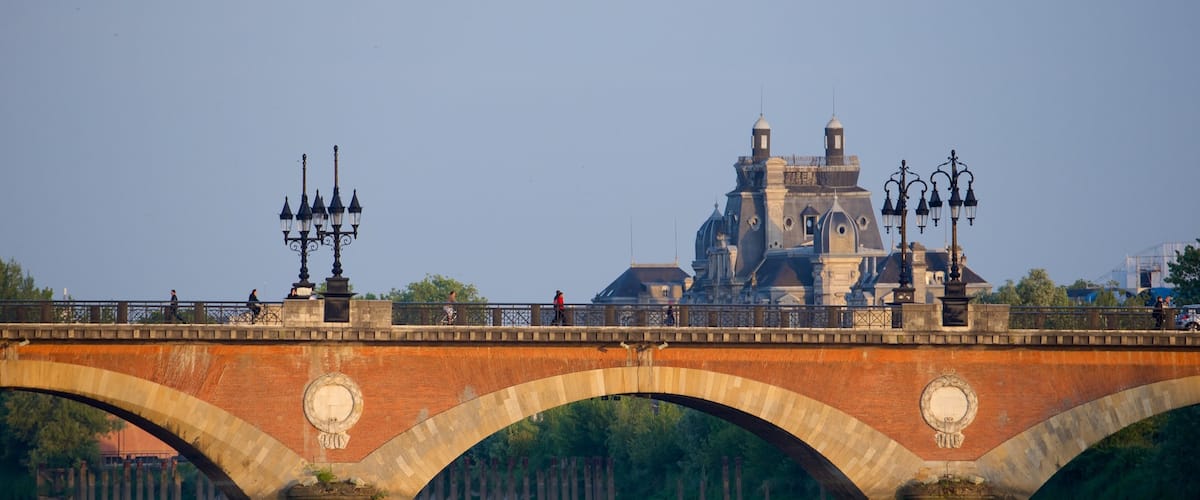 Pont de Pierre which includes a bridge and a river or creek