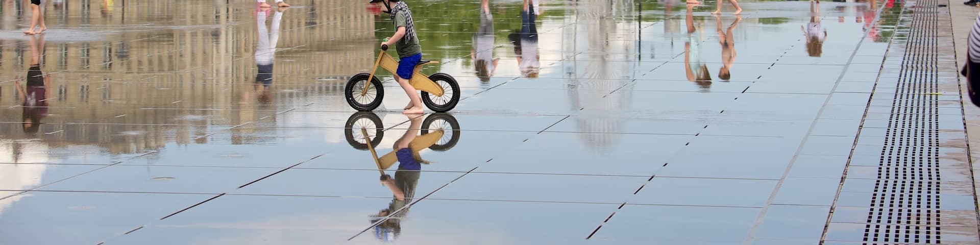 The Water Mirror which includes a square or plaza and a city