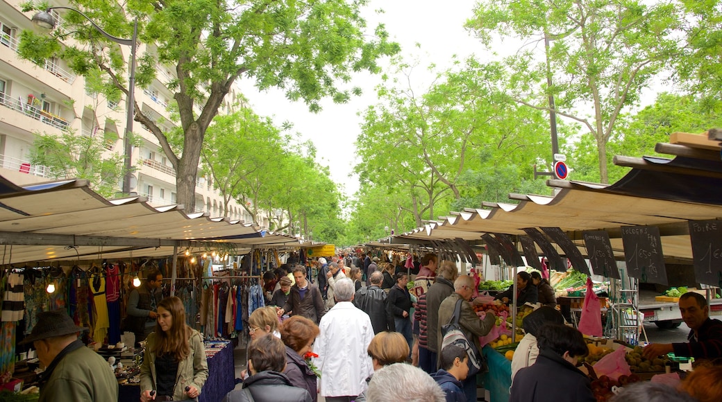 Montparnasse showing markets as well as a large group of people