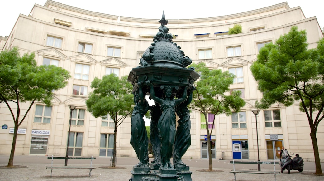 14th Arrondissement showing a square or plaza and a statue or sculpture