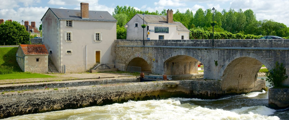 Saint-Aignan showing a bridge and a river or creek