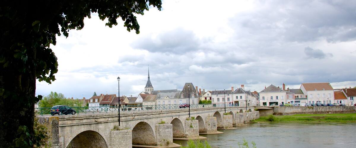 Selles-sur-Cher featuring a river or creek, a small town or village and a bridge