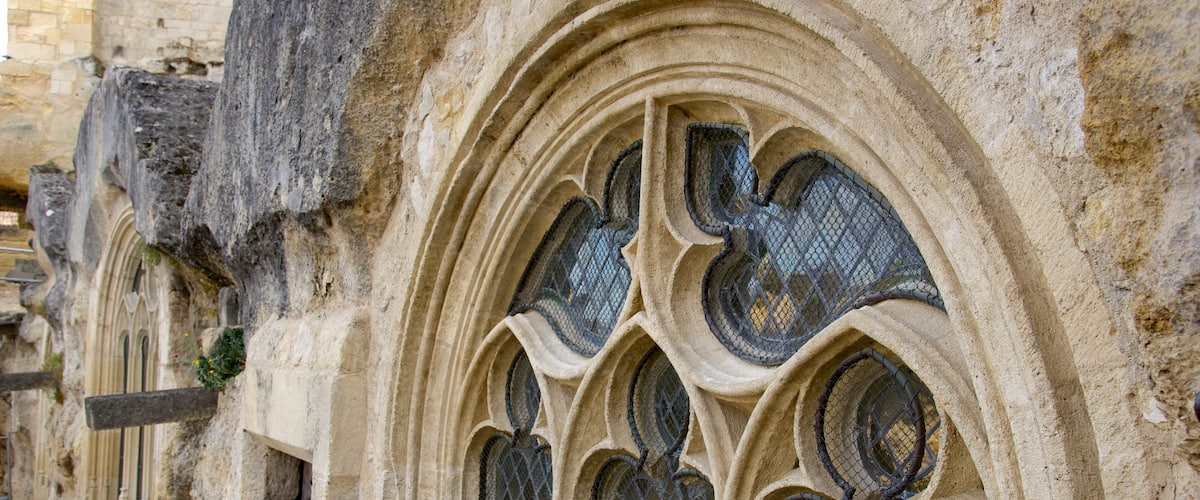 Eglise Monolithe which includes heritage architecture and a church or cathedral