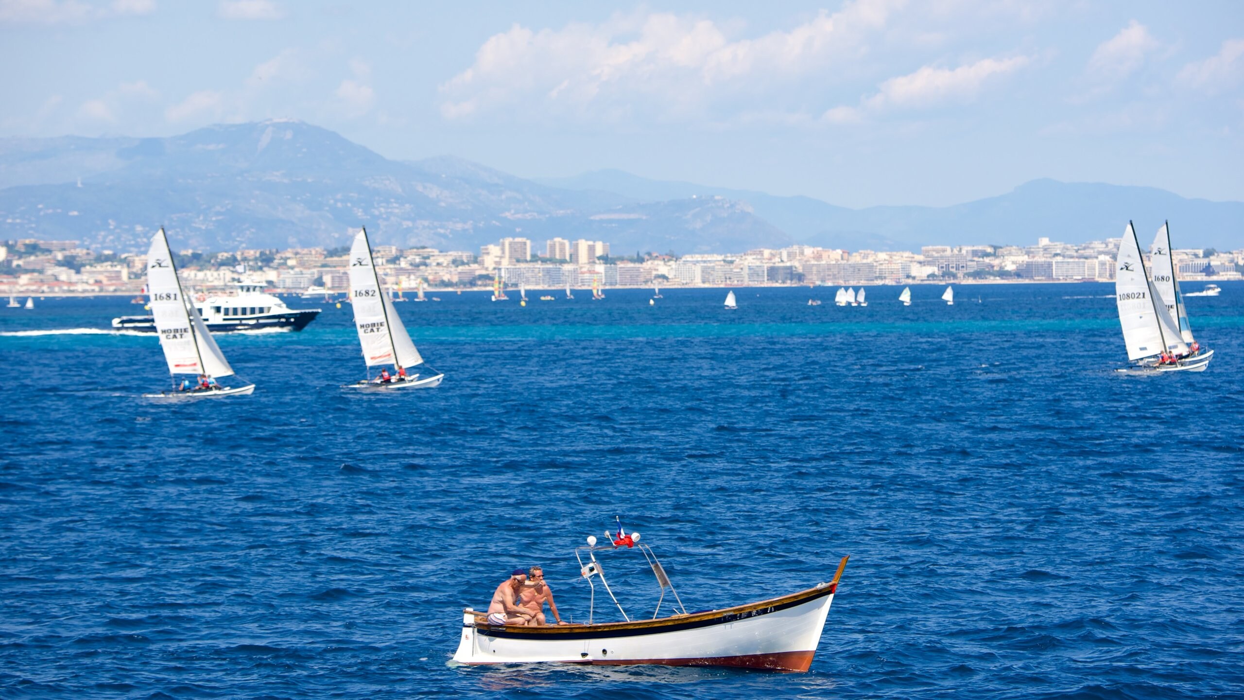 Cannes which includes boating, a bay or harbor and a coastal town
