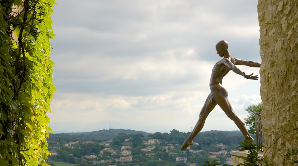 Mougins showing a statue or sculpture