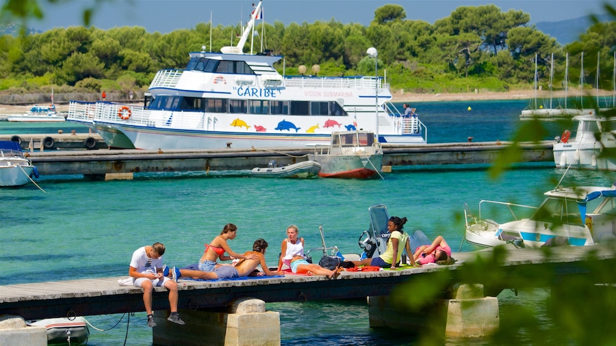 Ile Sainte-Marguerite featuring a ferry as well as a small group of people