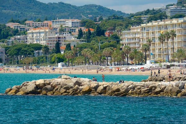Midi Beach featuring a coastal town and a sandy beach