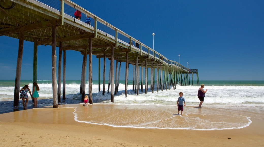 Ocean City Beach showing a beach and surf as well as a small group of people