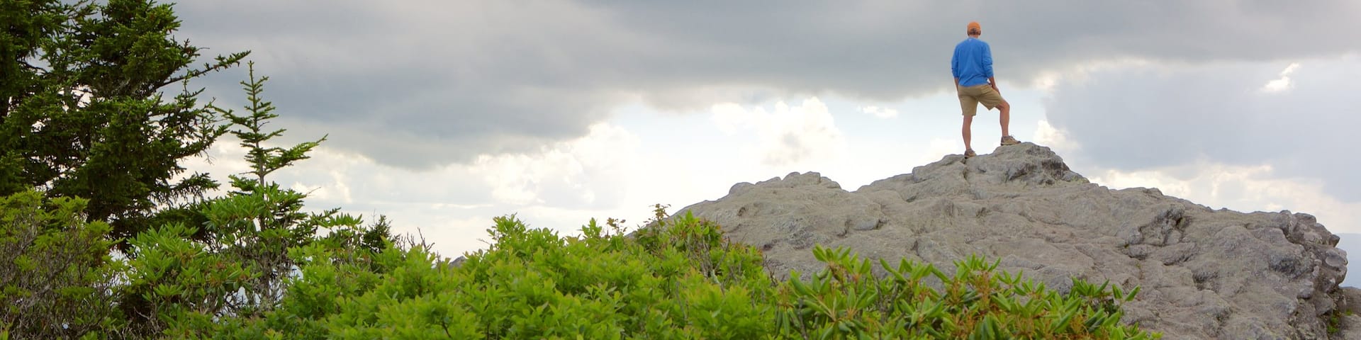 Grandfather Mountain which includes mountains as well as an individual male