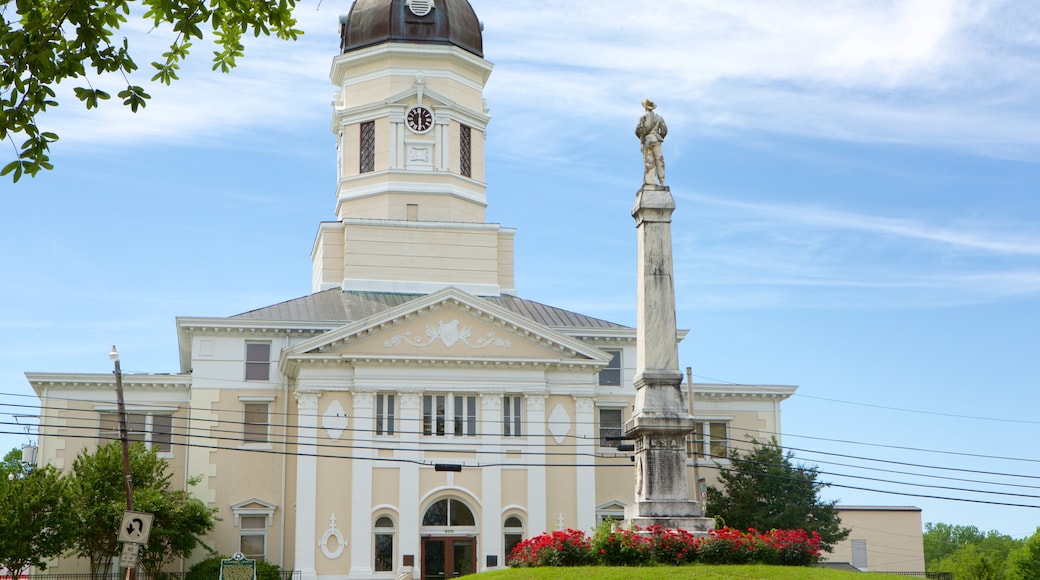 Port Gibson featuring a statue or sculpture, an administrative buidling and heritage architecture