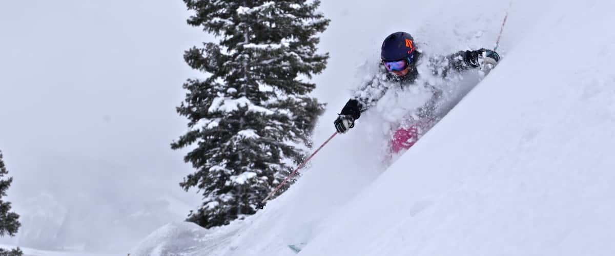 Crested Butte Mountain Resort showing snow skiing and snow as well as an individual female
