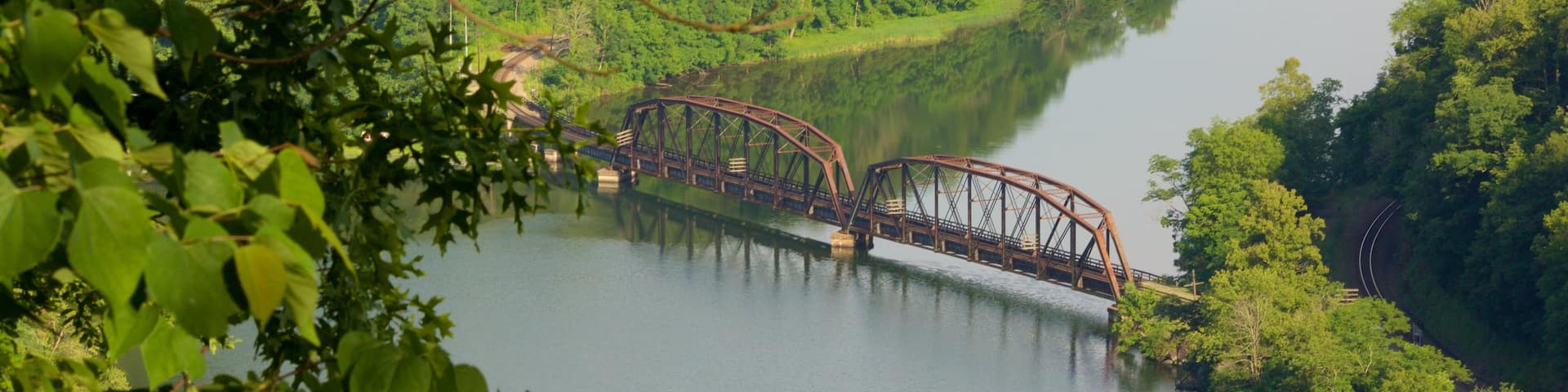 Hawks Nest State Park showing a bridge, tranquil scenes and a river or creek