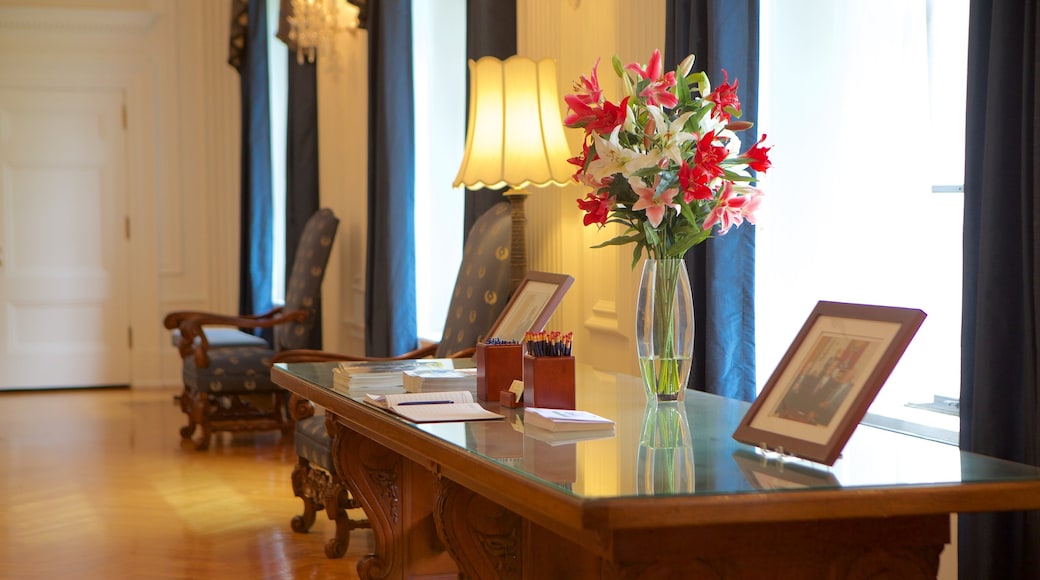 West Virginia State Capitol Building featuring an administrative building, interior views and flowers