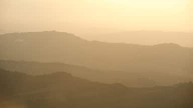 San Marino showing landscape views, tranquil scenes and a sunset