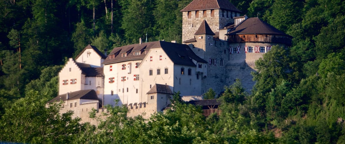 Vaduz Castle showing heritage architecture, forests and château or palace