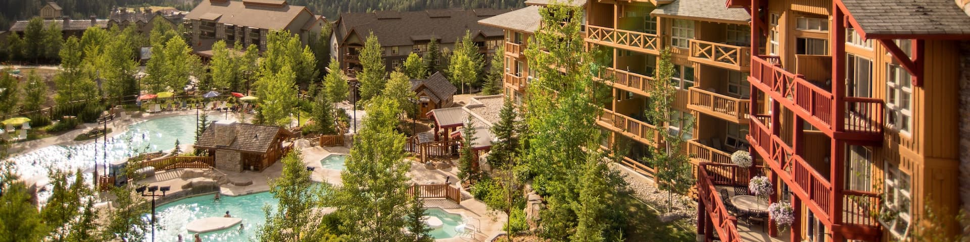 Panorama Mountain Ski Area which includes a small town or village, mountains and a luxury hotel or resort