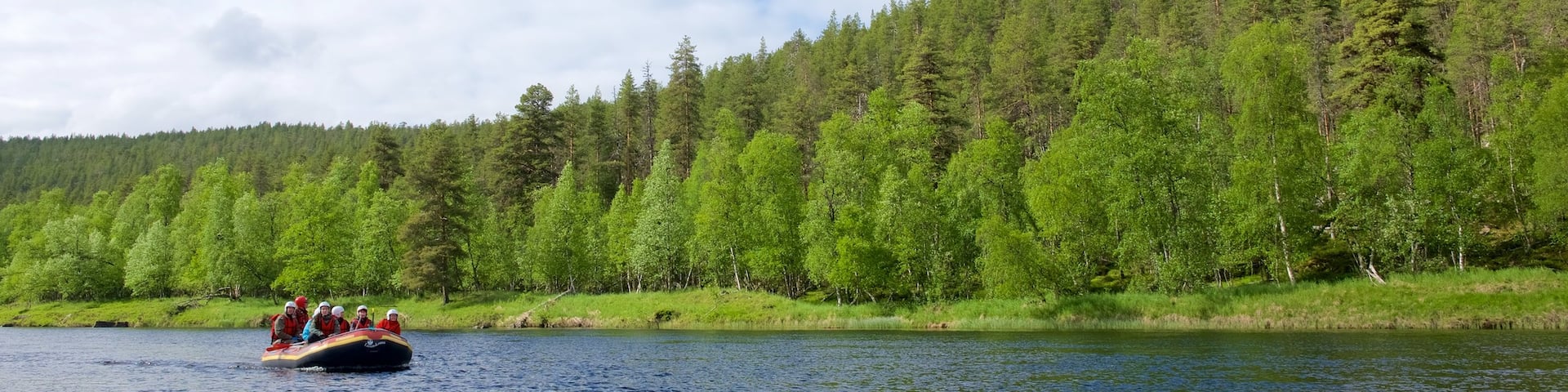 Ivalo which includes a river or creek, tranquil scenes and rafting