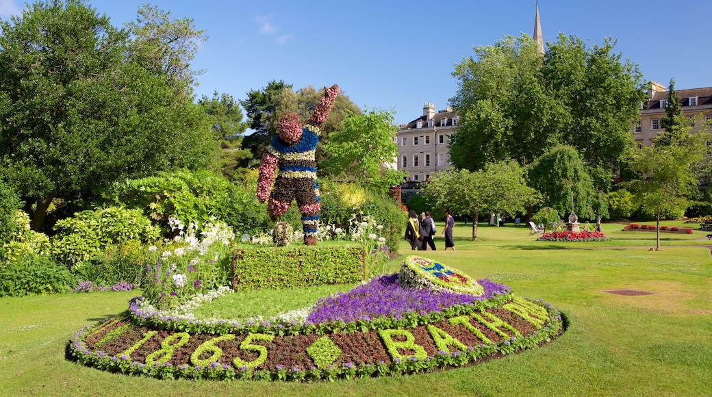 Paradetuinen bevat bloemen, een park en een monument