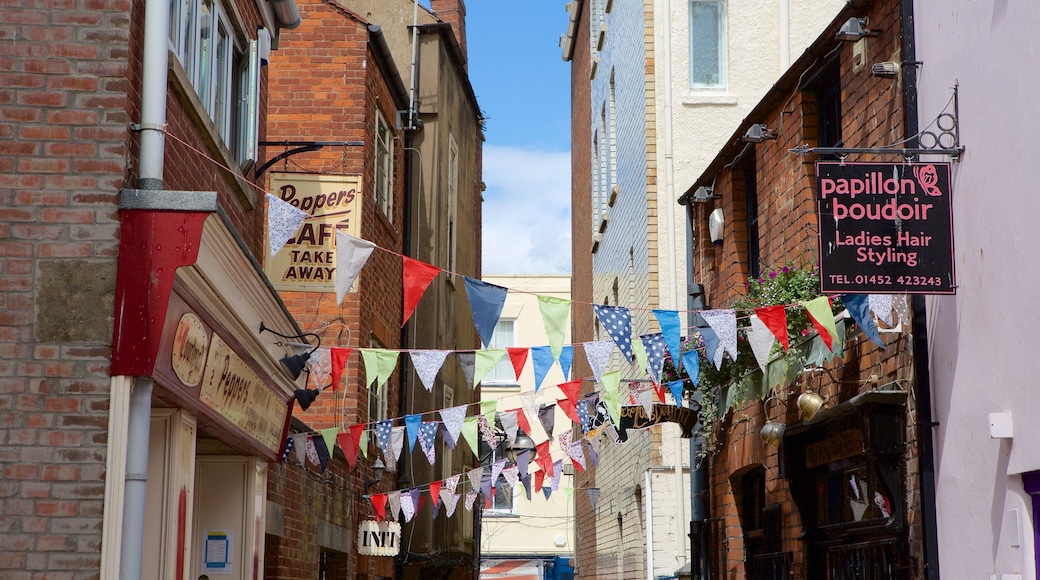 Gloucester featuring signage and a city