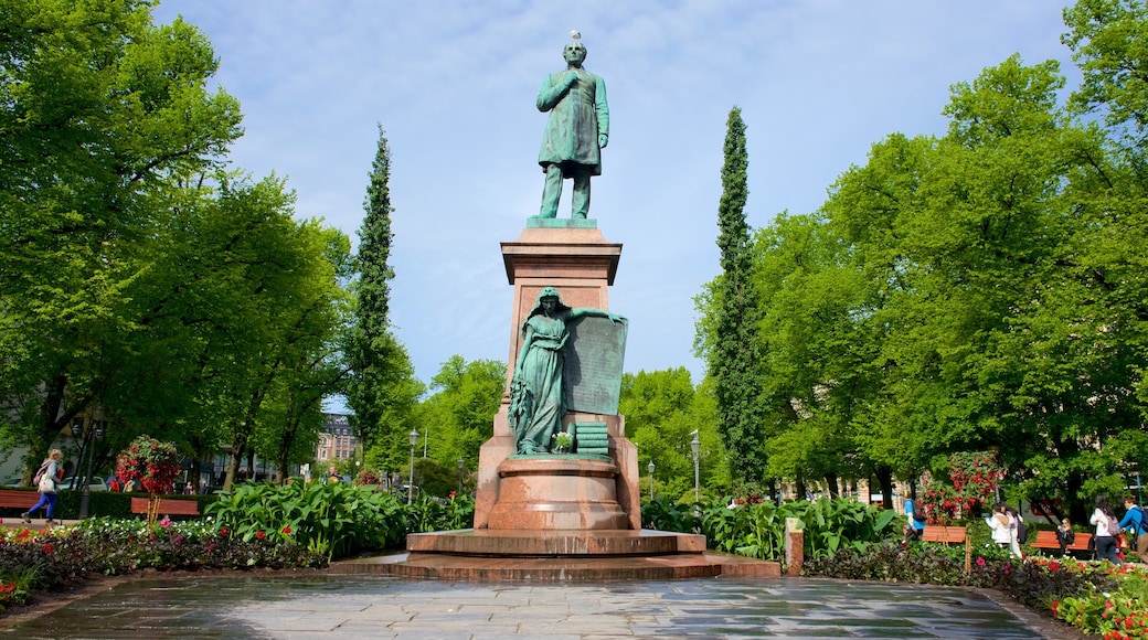 Esplanadi which includes a garden, a statue or sculpture and a monument