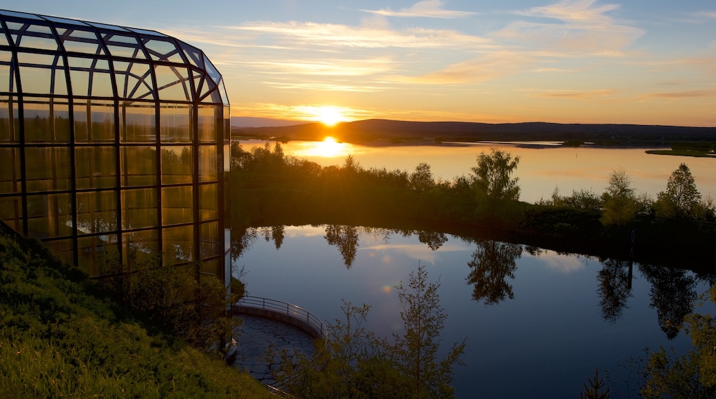 Arktikum showing tranquil scenes, a pond and a sunset