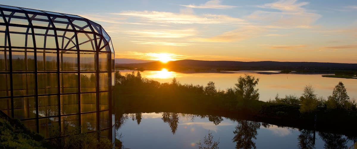 Arktikum featuring landscape views, a sunset and a river or creek