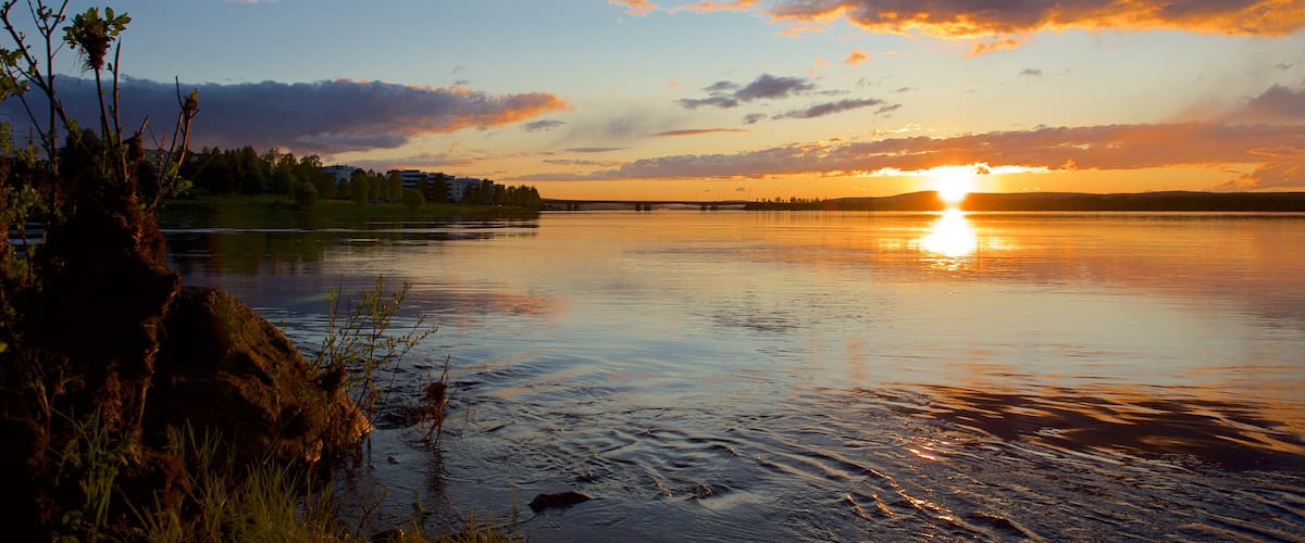 Rovaniemi which includes a sunset, landscape views and a river or creek