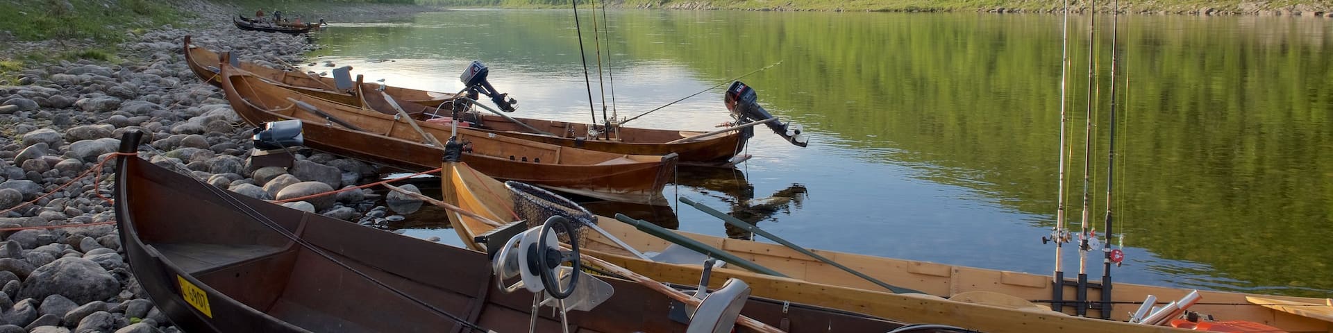 Utsjoki featuring a pebble beach, boating and landscape views