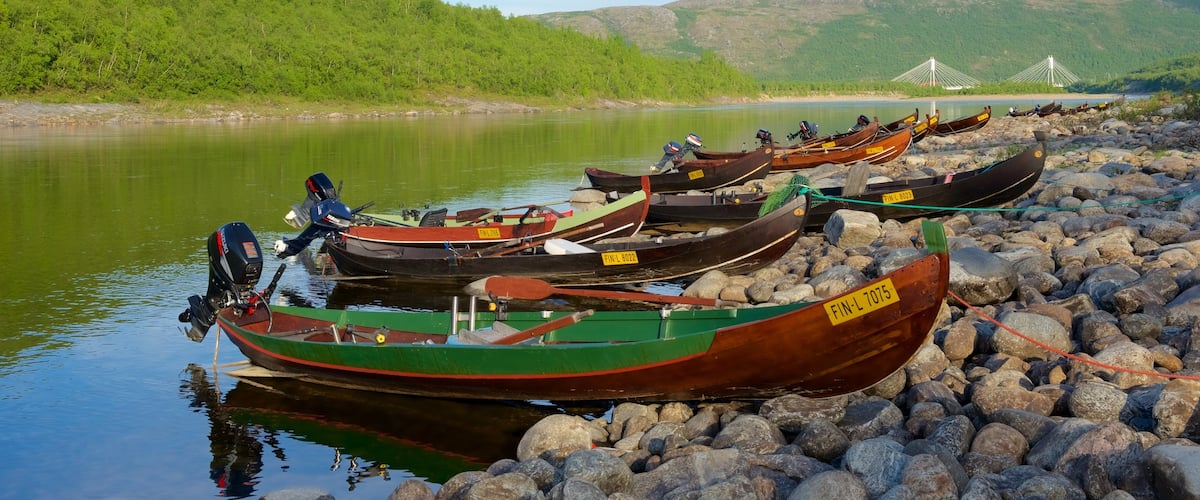 Utsjoki showing boating, a pebble beach and tranquil scenes