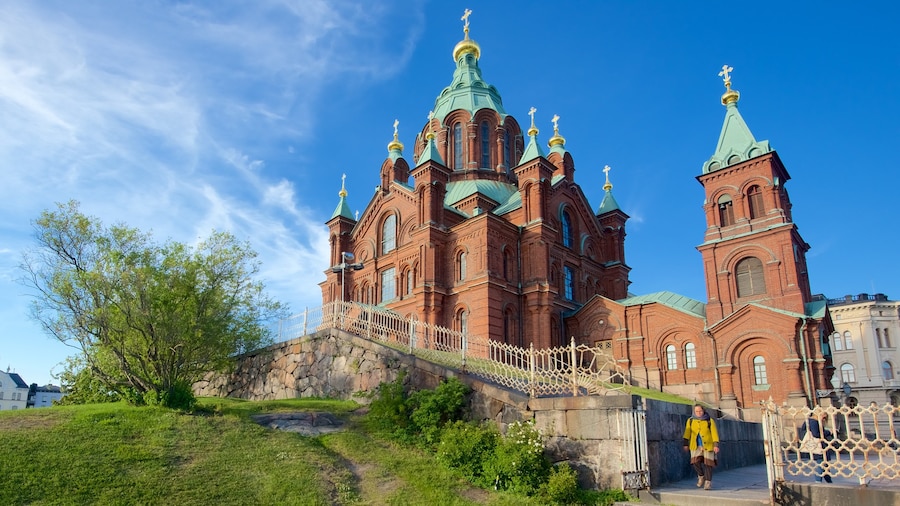 Uspenski Cathedral which includes heritage architecture and a church or cathedral as well as an individual femail