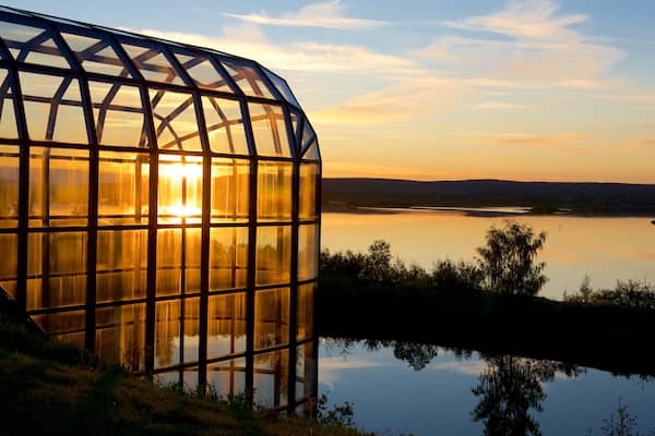 Arktikum featuring a river or creek, tranquil scenes and a sunset