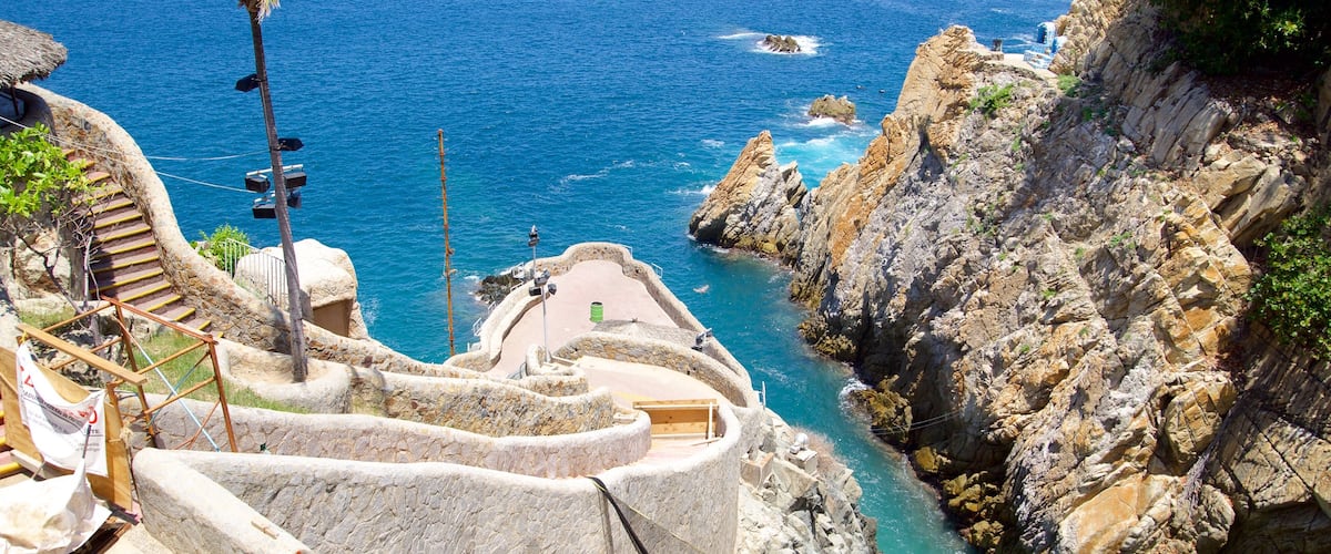Acapulco featuring rocky coastline and views