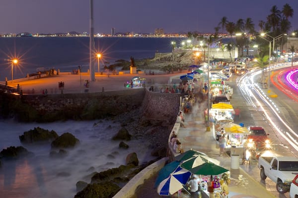 Olas Altas Beach featuring markets, rocky coastline and views