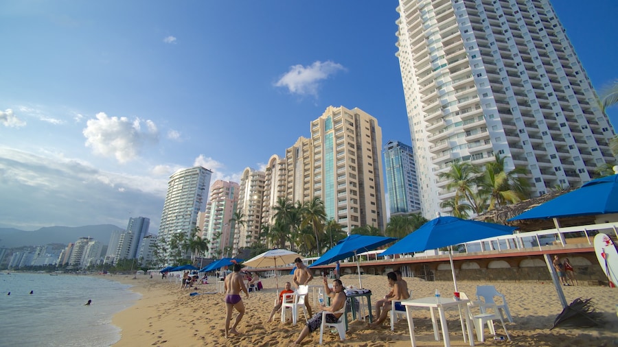 Icacos Beach featuring a city, a beach and a coastal town