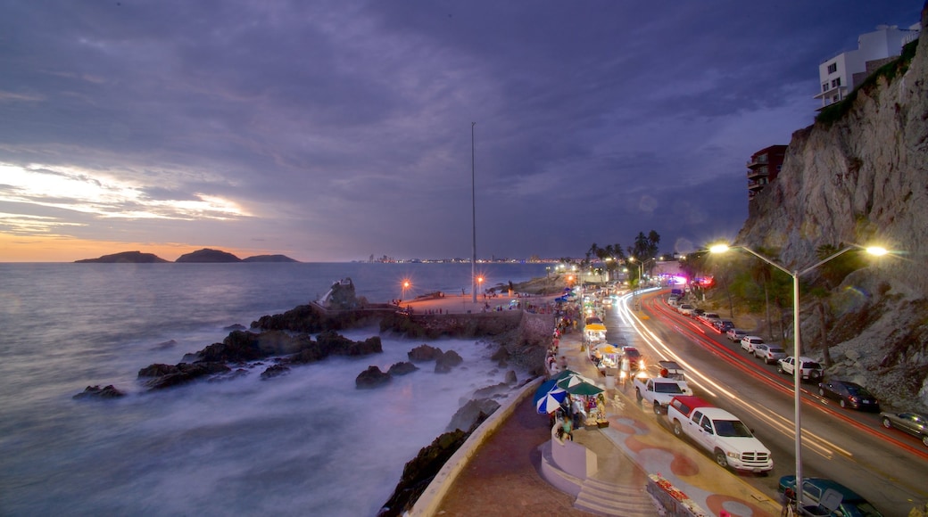 Olas Altas Beach showing rocky coastline and general coastal views