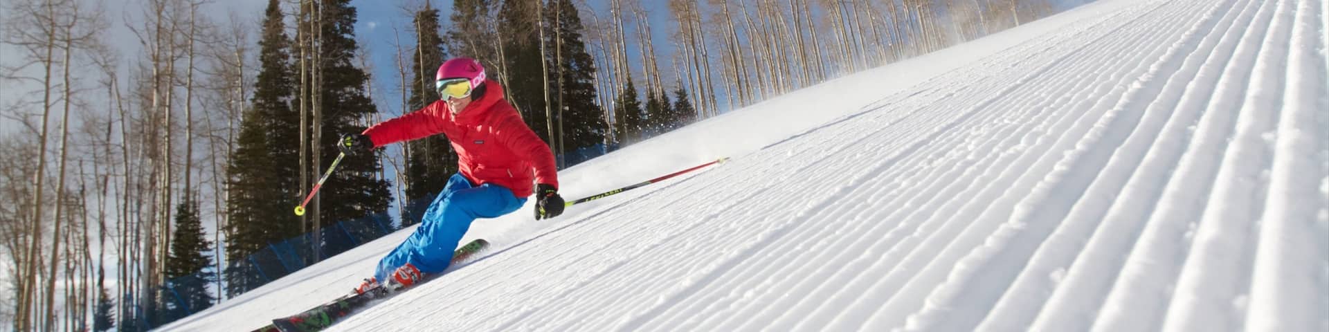 Buttermilk Mountain Ski Area featuring snow skiing and snow as well as an individual female