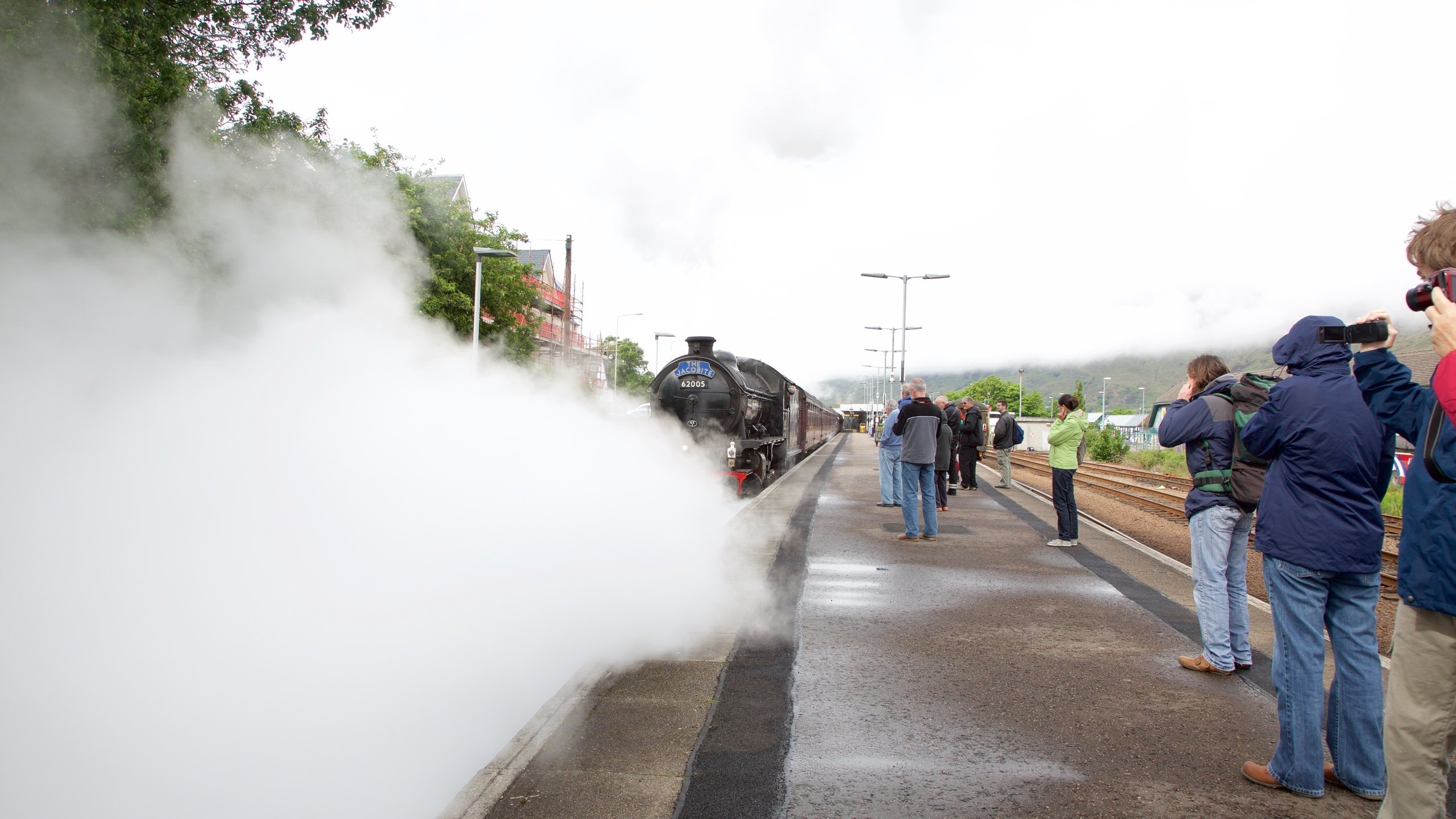 Fort William featuring railway items and heritage elements as well as a small group of people