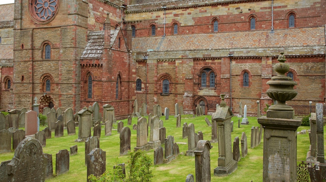 St. Magnus Cathedral featuring a cemetery, heritage elements and heritage architecture