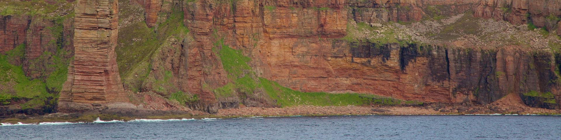 Old Man of Hoy which includes rugged coastline